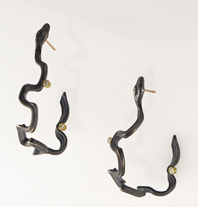 Snake earrings with diamond eyes