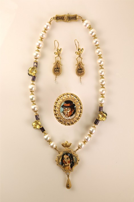 Collab_This is contemporary Native American art! Yellow gold, brilliant cut diamonds, silk knotted pearl strings with indigenous wampum, and fresh water pearls surround miniature portraits of Pocahontas